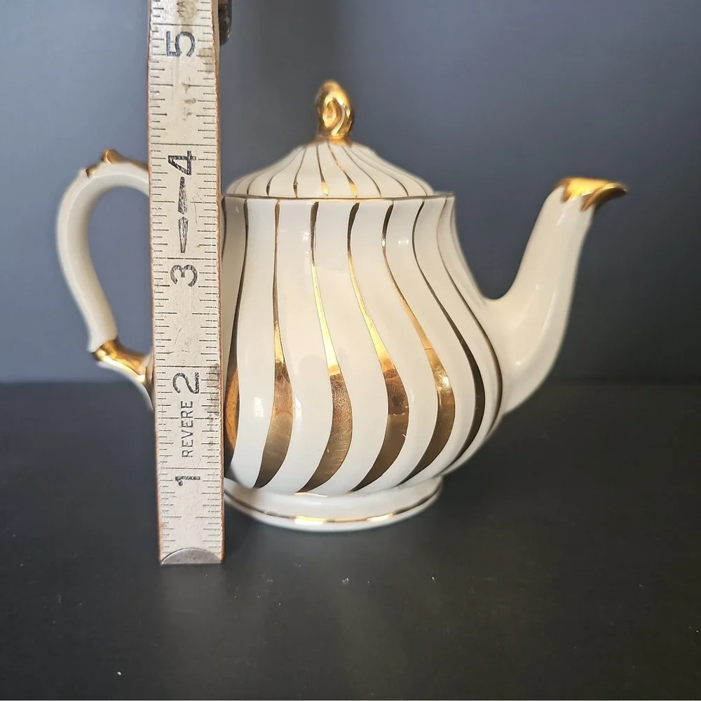 Sadler england gold